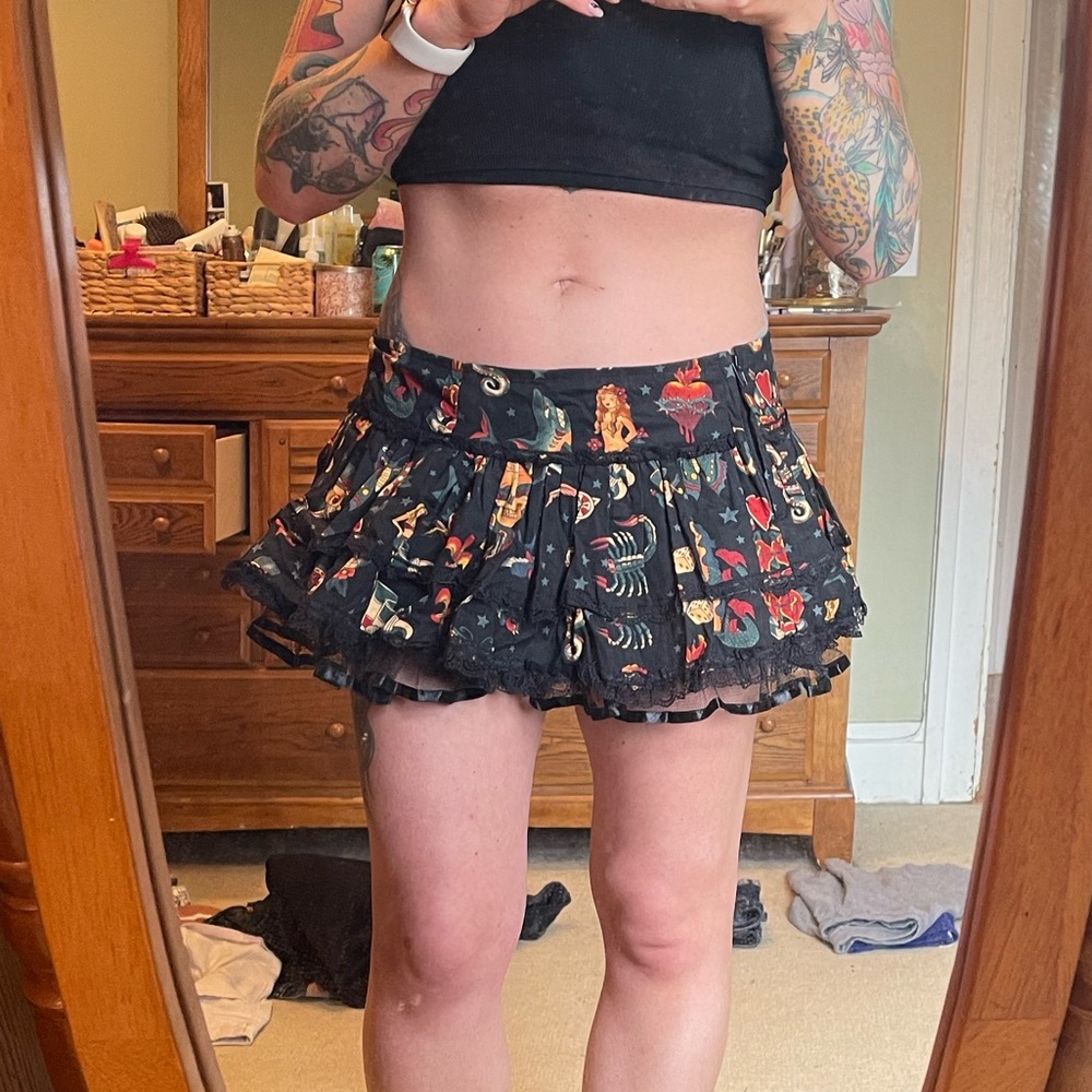 Living Dead Souls mini skirt with ruffles. Zip closure. Size medium.